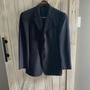 Lessons two piece 3 button suit, rarely worn.